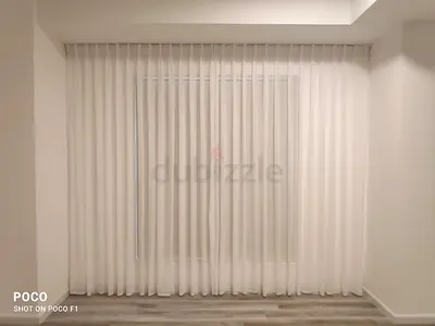White sheer floor-to-ceiling curtains (single panel set)