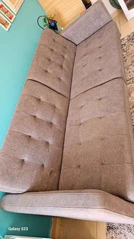 Large Three-seater fabric sofa bed cum lounger with metal legs