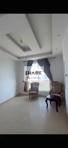 Two-bedroom apartment with a living room in Al Nuaimiya 3, City Towers, with an open view and a prime, vibrant location with all services available.