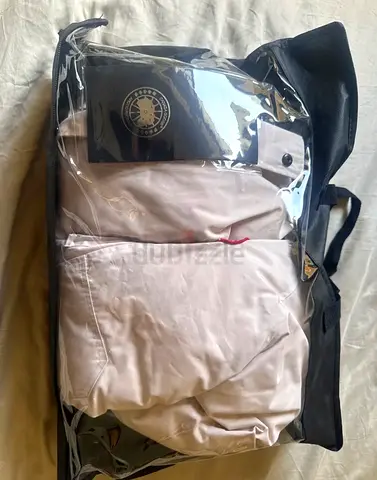 New beige Canada Goose jacket size Large (still in protective packaging) - unused