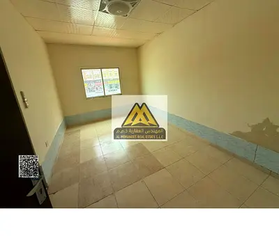Studio in Al Mowaihat 3, Ajman. Separate kitchen, split AC, good finishing, AED 18,000 in 4 payments. Prime location close to services with easy acces