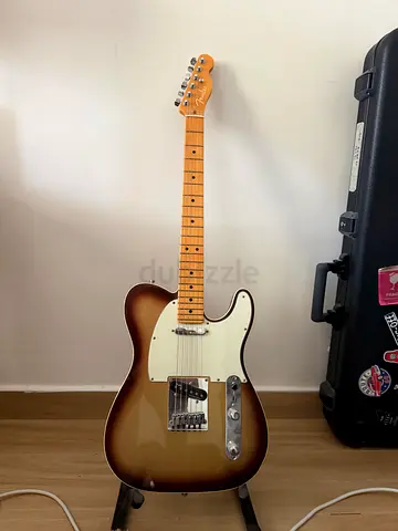 American ultra tele with hard case and amp