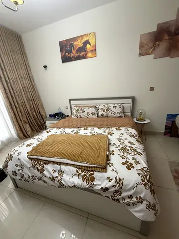 Queen bed with mattress and bedding set - good condition