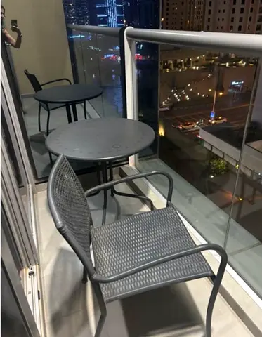 Round outdoor table with 2 chairs