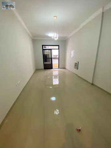 شقه مميزه جدا بنايه جديده بالكامل اول ساكن موقع هادئ متميز مساحه واسعه ببلكونه وغاز مركزي وسهل الانتقال لدبي والشارقه
