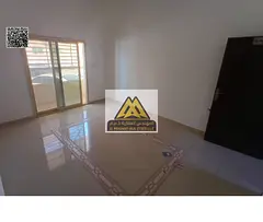 Ground floor in Al Rawda 3, Ajman. 2 bedrooms with living room, 2 bathrooms, balcony, central AC, AE
