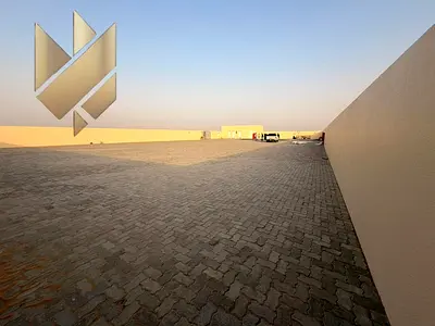 Industrial Yard for Rent in Al Sajaa | 20,000 Sq. Ft. | 25 kW Power Supply | Prime Location for Storage & Operations