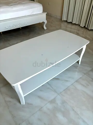 White wooden coffee table with lower shelf