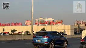 Commercial land for sale in Al Rawda 2 area