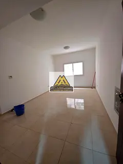 A one-bedroom apartment with a living room is available for annual rent in Al Jurf 2, Ajman. It boas