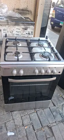 Stainless Steel 4-Burner Gas Cooker with Oven - Good Working Condition