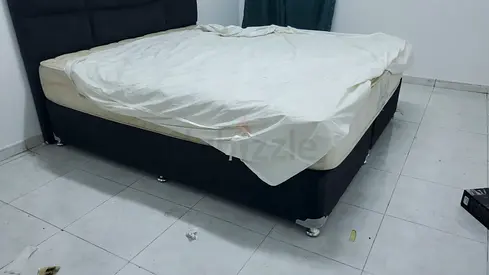 Queen size upholstered bed base with headboard - good condition