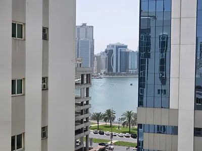 Clean one-bedroom apartment in Al Majaz 1 with free AC, built-in wardrobes and landlord-paid contract attestation, AED 45,000 yearly.