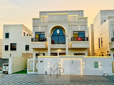 Villa for sale, including registration and ownership fees, near all services, close to Sheikh Mohammed Bin Zayed Road on a main street. A very prime l