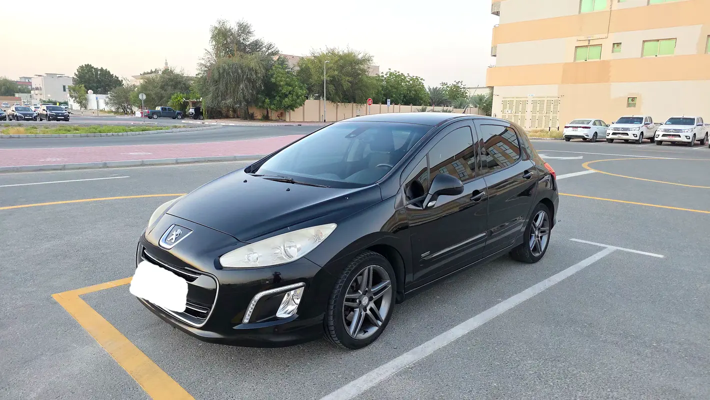 Peugeot 308 2013 — photo 1 of 15