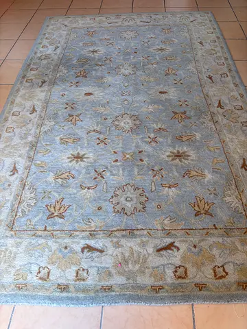 Light blue traditional area rug - 150cm x230cm(approx), hand made woolen from pottery barn ‘