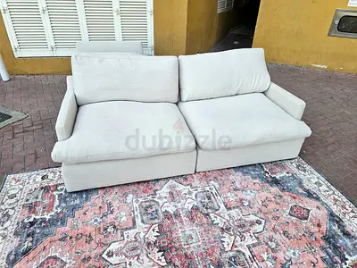 Two seater home center swin sofa