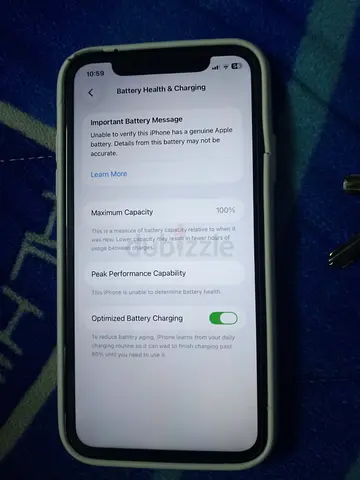 iPhone with new-looking battery — 100% Maximum Capacity (in case)
