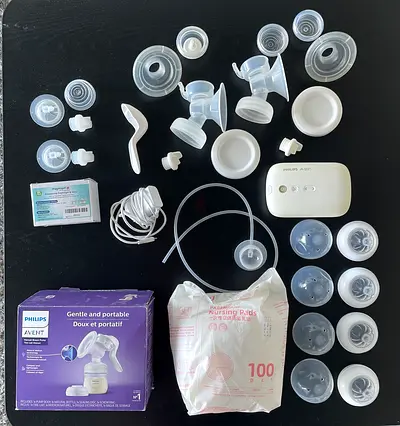 Philips Avent Electric Breast Pump + manual breast pump with spare parts + Nursing Pads bonus