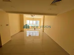 Two bedrooms and a living room on Al Khan Corniche, featuring a large area, good price, and prime lo