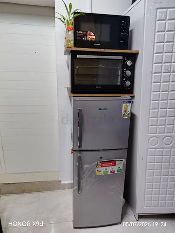 Double door fridge with oven and microwave stack - ideal for small kitchen