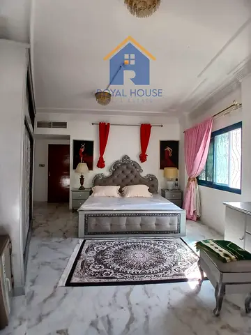 Two rooms and a hall in Al Majaz 2, suitable for sharing among girls only.