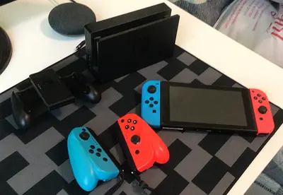 Nintendo Switch Console with Dock, 2 Pairs of Joy-Con (Red/Blue) With Charger - Good Condition