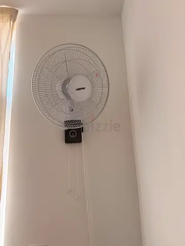 Wall-mounted oscillating electric fan — good working condition 2 Pcs