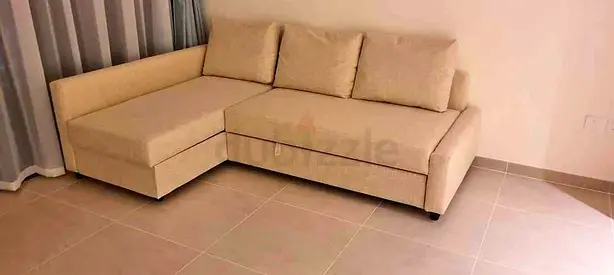 IKEA L shap Sofa store cum bed you can fix the storage