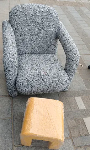 Single armchair with matching footstool - gray textured fabric for sale free delivery