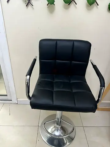 2* Black swivel bar stool with padded back and armrests