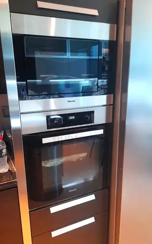 Miele 60 cm electric  oven and microw same like new conditon for sale