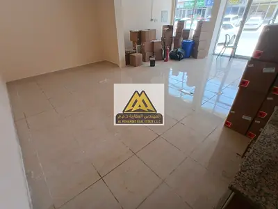 محل تجاري متميز للإيجار السنوي في الروضة 3 عجمان بموقع استراتيجي وسعر تنافسي