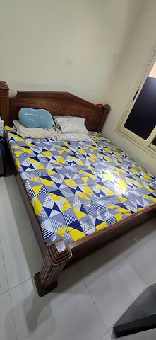 Solid wooden double bed with mattress - good condition