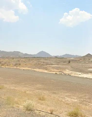 Two adjacent plots for sale in Masfout – Basin 8, in a prime location next to Al Mawaddah Mosque
