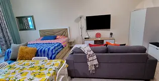 Spacious studio apartment with balcony - Looking for roomate to share with | Muweilah