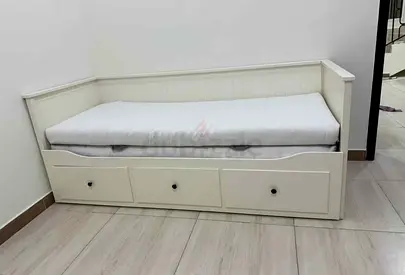 IKEA Hamnes Day bed with 3 storage drawers underneath and with 2 IKEA mattresses