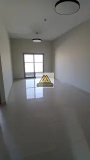 A luxurious 1-bedroom apartment with a living room for annual rent in Ajman, offering one of the lar