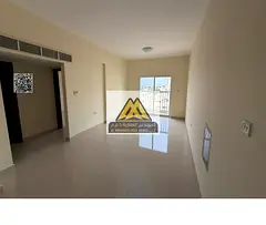 For rent: apartment in Al Nuaimiya 3, 1 bedroom and living room with balcony, central AC, spacious l