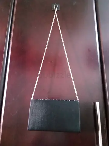 Black satin clutch bag with silver chain strap - good condition