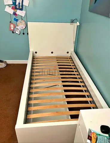 Ikea Single bed with mattress underneath 2 storage drawers available in perfect condition