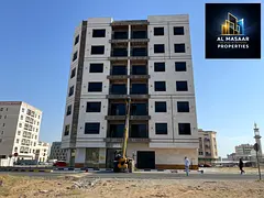 A six-story residential and commercial building (ground + 6 floors) (on the corner of two streets) i
