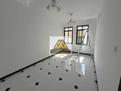 Luxury Family Residence in Al Rawda 3 - Modern Building with Smart Entry System and Free Parking