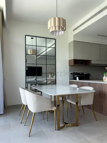 Modern White Marble Dining Table with 4 Quilted Chairs and Gold Legs