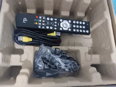 Used TV set-top box remote, power cable and AV cable (original accessories)