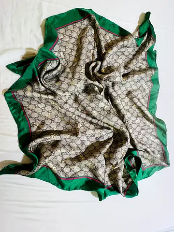 Silk designer-style square scarf with green border