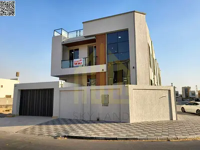 Villa for sale, including registration and ownership fees, near all services, close to Sheikh Mohammed Bin Zayed Road, on a main street, very prime lo