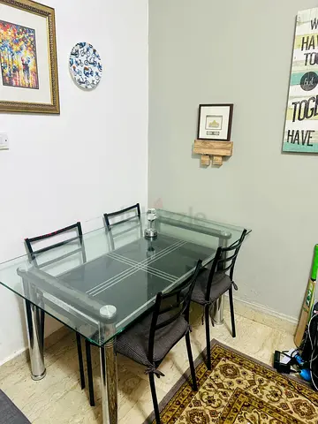 Dining table and 4 chairs available for sale