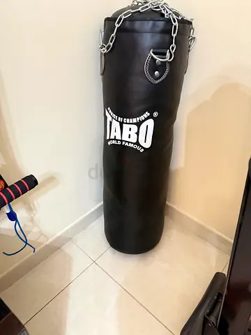 Heavy Punching Bag with Chain - Good Condition available chain to hand from ceiling or wall bracket