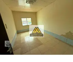 Studio in Al Mowaihat 3, Ajman. Separate kitchen, split AC, AED 18,000 in 4 payments, maintenance co